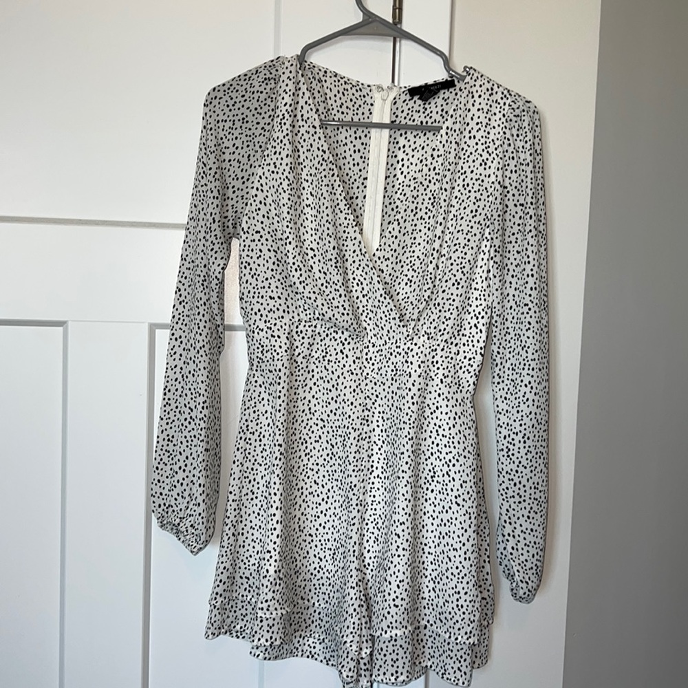 Long sleeved polka dot printed romper